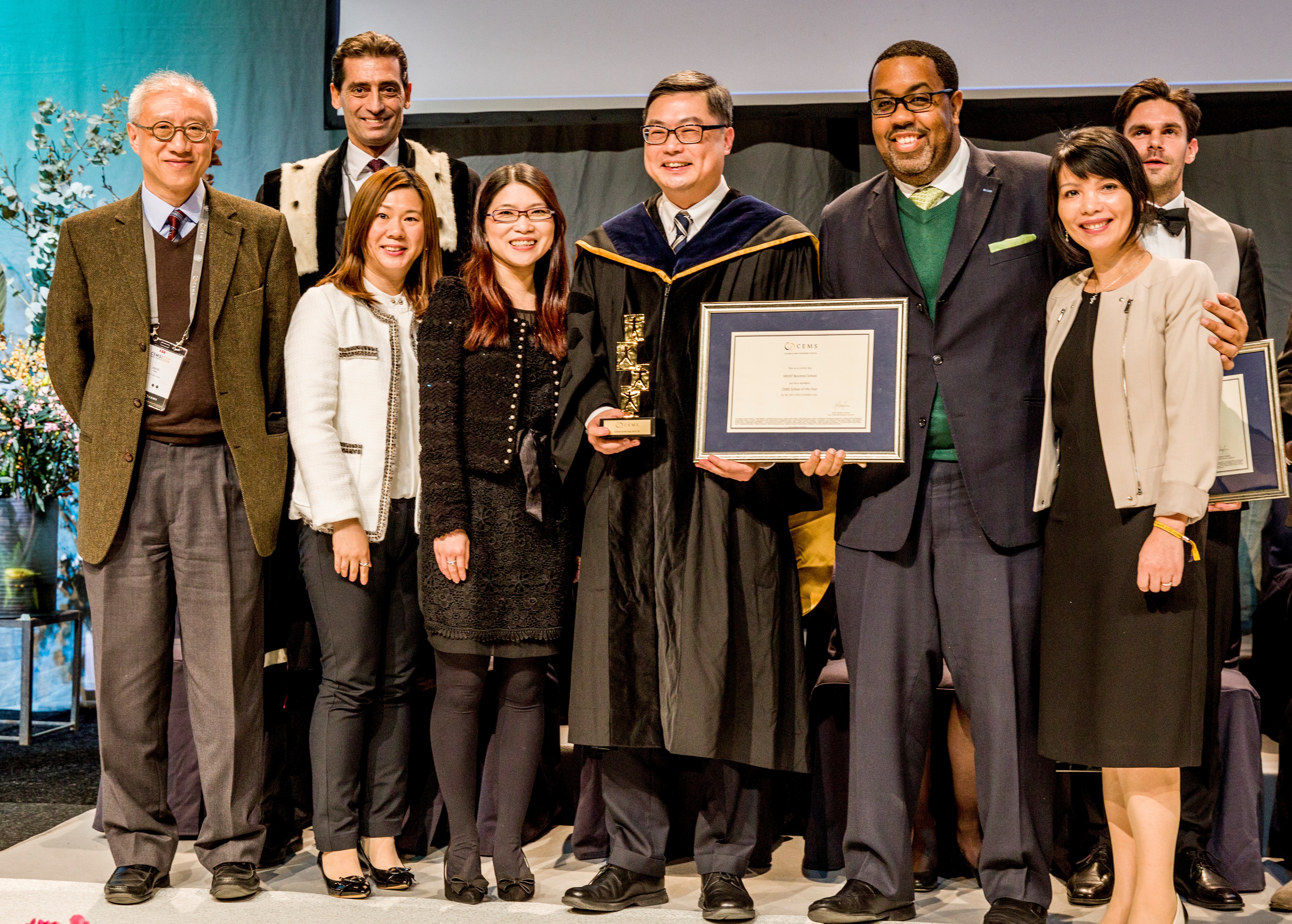  Management of the School receives the awards at the presentation ceremony in Sweden.
