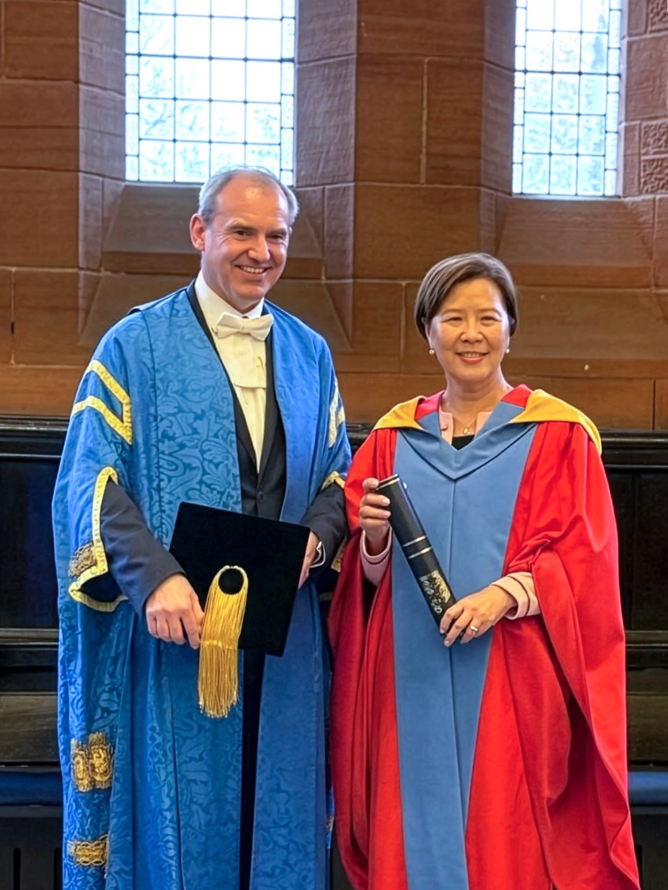 A group photo of Prof. Nancy IP (left) and Stephen MCARTHUR, Principal and Vice-Chancellor of the University of Strathclyde (right).