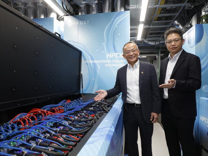 HKUST Vice-President for Research and Development Prof. Tim CHENG (left) and Director of HKUST’s Information Technology Services Center Dr. Samuel KWAN introduce the city’s largest Liquid Immersion Cooling system launched by the University.